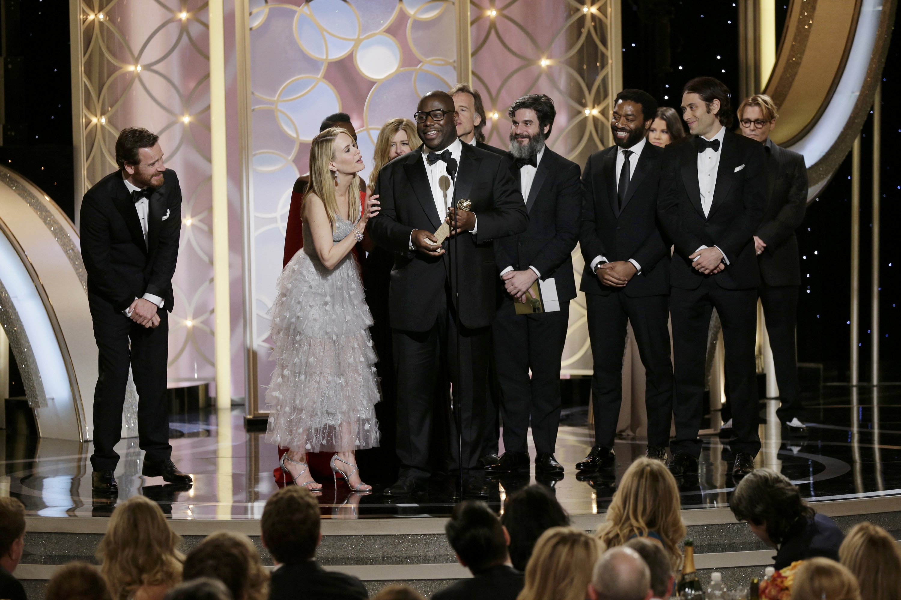 Steve McQueen celebrates during the 71st annual Golden Globe Awards in Beverly Hills