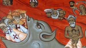 Duvar resminde Tito askeri üniformasıyla, Marx ve Engels’in yanında görülüyor. Fotoğraflar BBC'den alınmıştır.