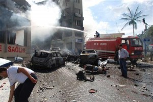 Smoke rises from the site of an explosion in the town of Reyhanli near the Turkish-Syrian border