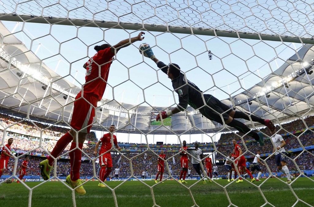 Switzerland's goalkeeper Benaglio conceded a goal scored by France's Giroud during their 2014 World Cup Group E soccer match at the Fonte Nova arena in Salvador