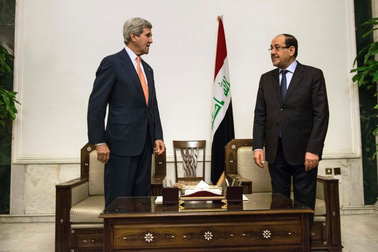 Kerry ve Maliki'nin basına poz verirken kullandıkları vücut dili, görüşmenin gergin geçtiğine yoruldu.
