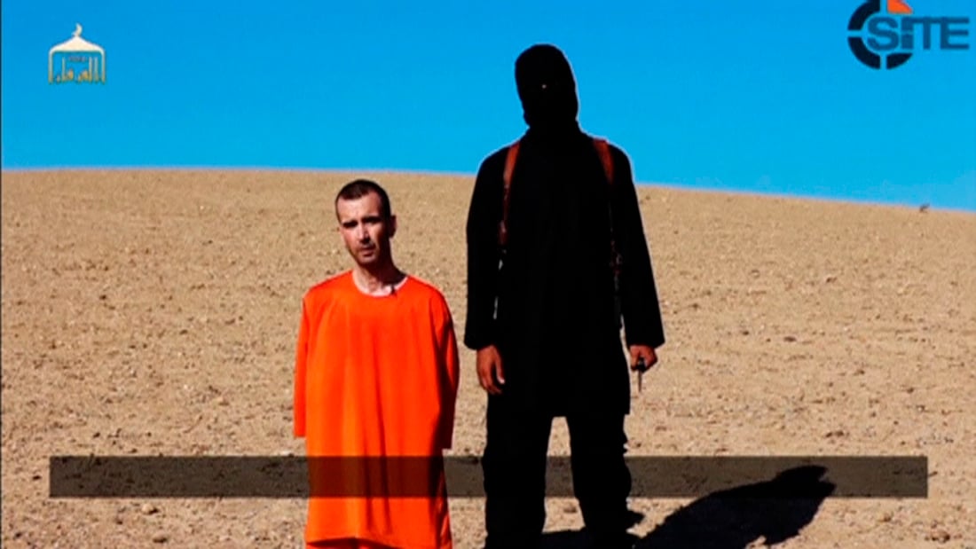 A still image taken from a purported Islamic State video of British captive David Haines before he is beheaded