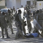 Turkish security forces detain protestors near the Mursitpinar border crossing on the Turkish-Syrian border, near the southeastern town of Suruc