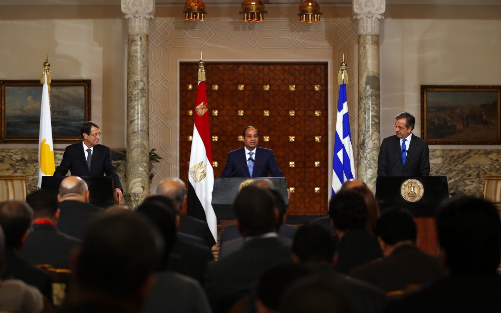 Egypt's President Abdel Fattah al-Sisi speaks during a news conference with Cyprus' President Nicos Anastasiades and Greek Prime Minister Antonis Samaras after their summit at the presidential palace in Cairo