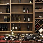 Fallen wine bottles are seen at Cult Following Wine Bar after an earthquake in Napa, California