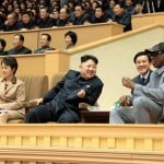 North Korean leader Kim Jong Un watches a basketball game between former U.S. NBA basketball players and North Korean players of the Hwaebul team of the DPRK with Dennis Rodman at Pyongyang Indoor Stadium