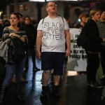 Protesters march against the New York City grand jury decision to not indict in the death of Eric Garner, in Oakland, California