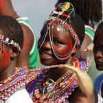 Maasai girls, dressed in their traditional wear, prepare to participate in the Maasai Olympics 2014 at the Sidai Oleng wildlife sanctuary in Kajiado