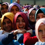 Students of Tevfik Ileri Imam Hatip School wait for the arrival of President Tayyip Erdogan for the opening ceremony in Ankara