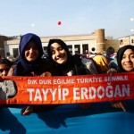 Students of Tevfik Ileri Imam Hatip School wait for the arrival of President Tayyip Erdogan for the opening ceremony in Ankara