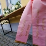 Flowers and a wreath a placed outside the mosque before a memorial service for late student Tugce A. in Waechtersbach