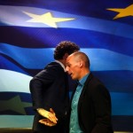 Dijsselbloem, head of the euro zone finance ministers' group, and Greek Finance Minister Varoufakis shake hands after their common press conference at the ministry in Athens
