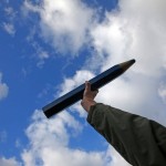 A man holds a pencil as he takes part in a solidarity march (Marche Republicaine) in the streets of Paris