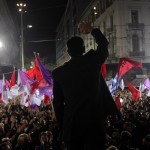 Alexis Tsipras, opposition leader and head of radical leftist Syriza party, waves to supporters during an election rally in Athens
