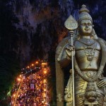 Hindu devotees climb the steps to Batu Caves temple during Thaipusam in Kuala Lumpur