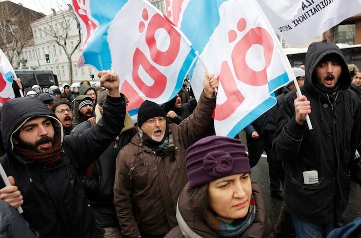 Supporters of the Turkish left-wing Freedom and Solidarity Party (ODP), shout slogans in favour of Greece's ruling Syriza party during a protest against a G20 meeting in Istanbul