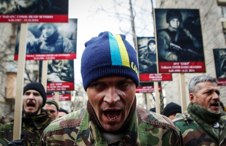 Activists of the Right Sector political party attend an anti-government march in Kiev
