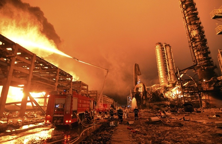 Firefighters try to extinguish a fire at a petrochemical plant in Zhangzhou