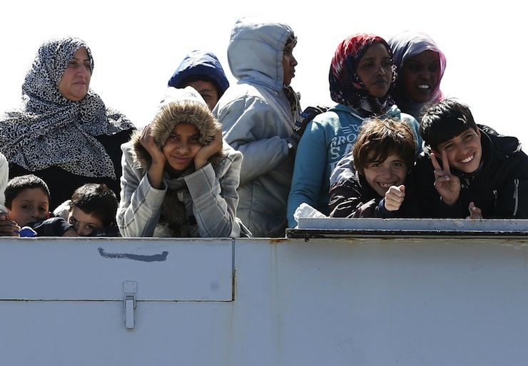 Migrants arrive at the Sicilian harbor of Augusta
