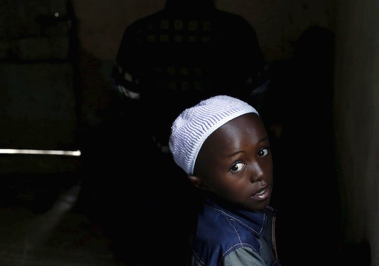 A Christian boy attends an Easter Sunday service in a church in Garissa