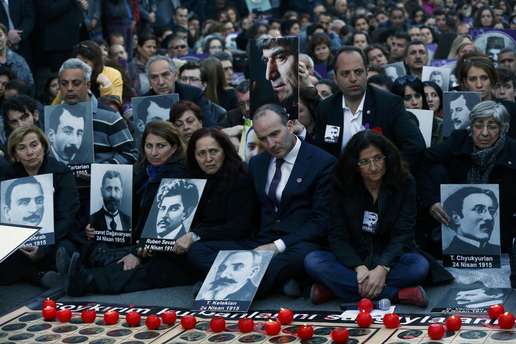 Activists hold portraits of victims during a silent demonstration near the French consulate to commemorate the mass killings of Armenians by Ottoman Turks in Istanbul April 24, 2015. REUTERS/Murad Sezer