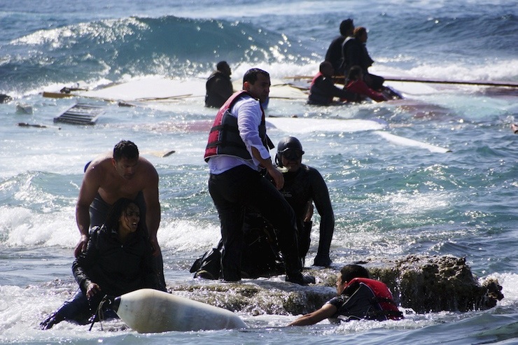 Migrants, who are trying to reach Greece, are rescued by members of the Greek Coast guard and locals near the coast of the southeastern island of Rhodes