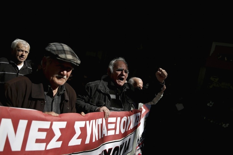 A pensioner shouts slogans during an anti-austerity demonstration in Athens