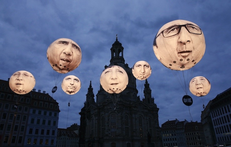 Balloons made by the 'ONE' campaigning organisation depicting leaders of the countries members of the G7 in Dresden