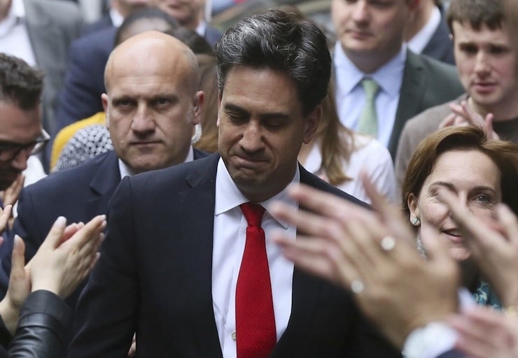 Labour Party leader Ed Miliband arrives at his party's headquarters after Britain's general election, in London