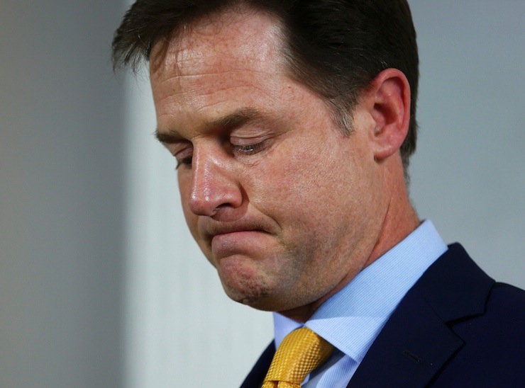 Britain's Liberal Democrat leader Nick Clegg announces his resignation as leader at a news conference in London
