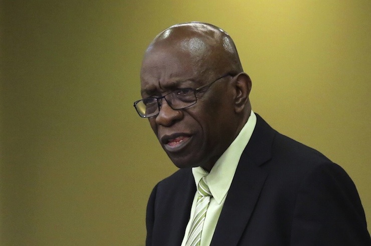 Former FIFA vice-president Jack Warner, who is a parliamentary representative for Chaguanas West, addresses fellow members of parliament during a session in Port-of-Spain, June 5, 2015. Warner, a central figure in world soccer's deepening scandal, on Wednesday vowed to tell investigators all he knows about corruption within the sport's governing body. REUTERS/Andrea de Silva
