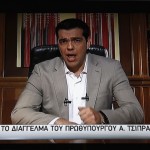Greek Prime Minister Alexis Tsipras is seen on a television monitor while addressing the nation in Athens, Greece