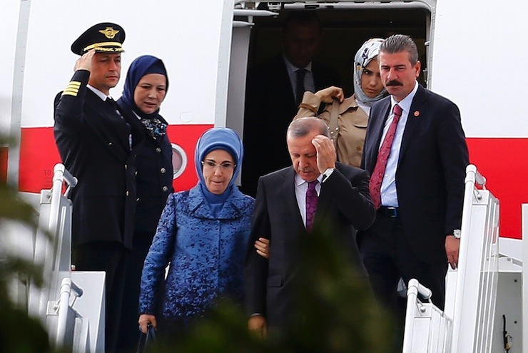 Turkish President Erdogan and his wife Emine arrive at Esenboga Airport
