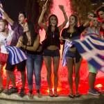 “No” supporters celebrate referendum results on a street in central in Athens