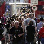 Commuters emerge from Victoria Station in London