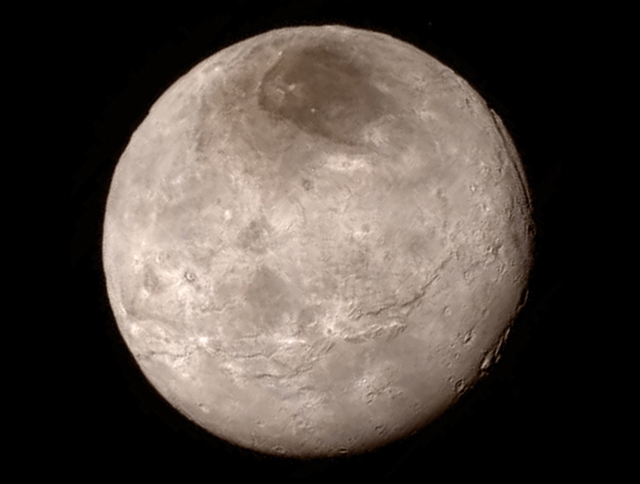 New details of Plutos largest moon Charon are revealed in this image from New Horizons Long Range Reconnaissance Imager (LORRI), taken late on July 13, 2015 from a distance of 289,000 miles  (466,000 kilometers) in a picture released by NASA in Laurel, Maryland July 15, 2015. A U.S. spacecraft sailed past the tiny planet Pluto in the distant reaches of the solar system on Tuesday, capping a journey of 3 billion miles (4.88 billion km) that began nine and a half years ago. NASA's New Horizons spacecraft passed by the ice-and-rock planetoid and its entourage of five moons at 7:49 a.m. EDT (1149 GMT). The event culminated an initiative to survey the solar system that the space agency embarked upon more than 50 years ago.  REUTERS/NASA New Horizons/Handout via Reuters   TPX IMAGES OF THE DAY. THIS IMAGE HAS BEEN SUPPLIED BY A THIRD PARTY. IT IS DISTRIBUTED, EXACTLY AS RECEIVED BY REUTERS, AS A SERVICE TO CLIENTS. FOR EDITORIAL USE ONLY. NOT FOR SALE FOR MARKETING OR ADVERTISING CAMPAIGNS