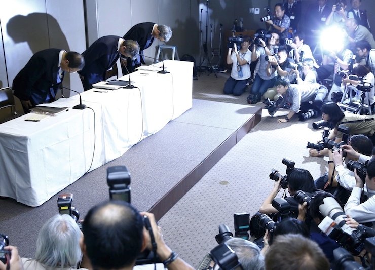 Toshiba Corp President and Chief Executive Officer Tanaka, Chairman of the Board Muromachi and Corporate Executive Vice President Maeda bow at the start of news conference at the company headquarters in Tokyo