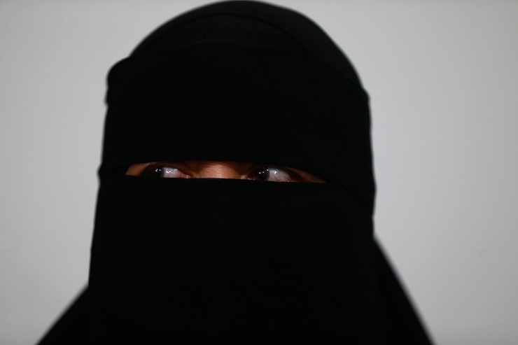An Uighur refugee talks during an interview with Reuters in Istanbul