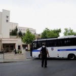 A Turkish police van arrives at the U.S. consulate building after an attack in Istanbul, Turkey