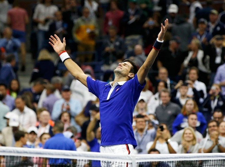 Novak Djokovic of Serbia celebrates after defeating Roger Federer of Switzerland in their men's singles final match at the U.S. Open Championships tennis tournament in New York, September 13, 2015. REUTERS/Shannon Stapleton (TPX IMAGES OF THE DAY)