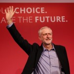 The new leader of Britain's opposition Labour Party Jeremy Corbyn waves after making his inaugural speech at the Queen Elizabeth Centre in central London