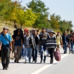 Syrian migrants walk towards the Greece border on a road near Edirne