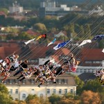Visitors ride a merry-go-round during the opening day of the 182nd Oktoberfest in Munich