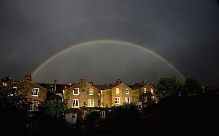 A double rainbow is seen above a row of terrace houses in Clapham, south London, Britain September 1, 2015. The second rainbow, above the main arc has the sequence of its colours reversed, with red on the inner side of the bow.  REUTERS/Dylan Martinez        TPX IMAGES OF THE DAY