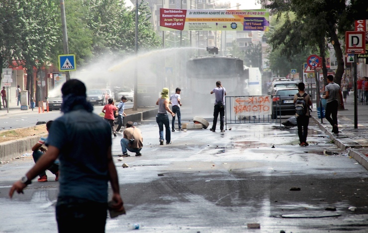 Riot police use water cannon to disperse stone throwing protesters in the Kurdish dominated southeastern city of Diyarbakir, Turkey
