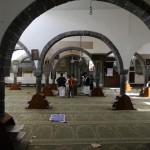 People gather inside the al-Balili mosque after two bombings hit the mosque in Yemen's capital Sanaa
