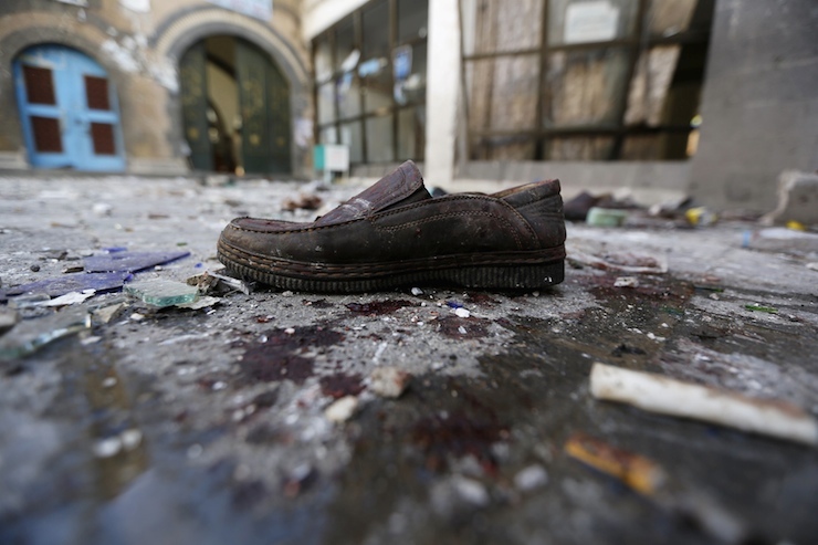 Shoe is seen at the scene of a bombing inside the al-Balili mosque after two bombings hit the mosque in Yemen's capital Sanaa