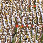 School children dressed as Mahatma Gandhi take part in an attempt to set a world record during celebrations to mark the 146th birth anniversary of Gandhi in Bengaluru