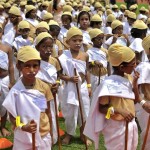 School children dressed as Mahatma Gandhi take part in an attempt to set a world record during celebrations to mark the 146th birth anniversary of Gandhi in Bengaluru