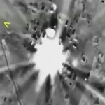 Frame grab shows airstrikes carried out by Russian air force hitting target in Syria